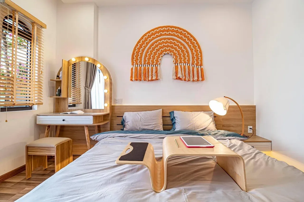 gallery wall above bed headboard framed art bedroom