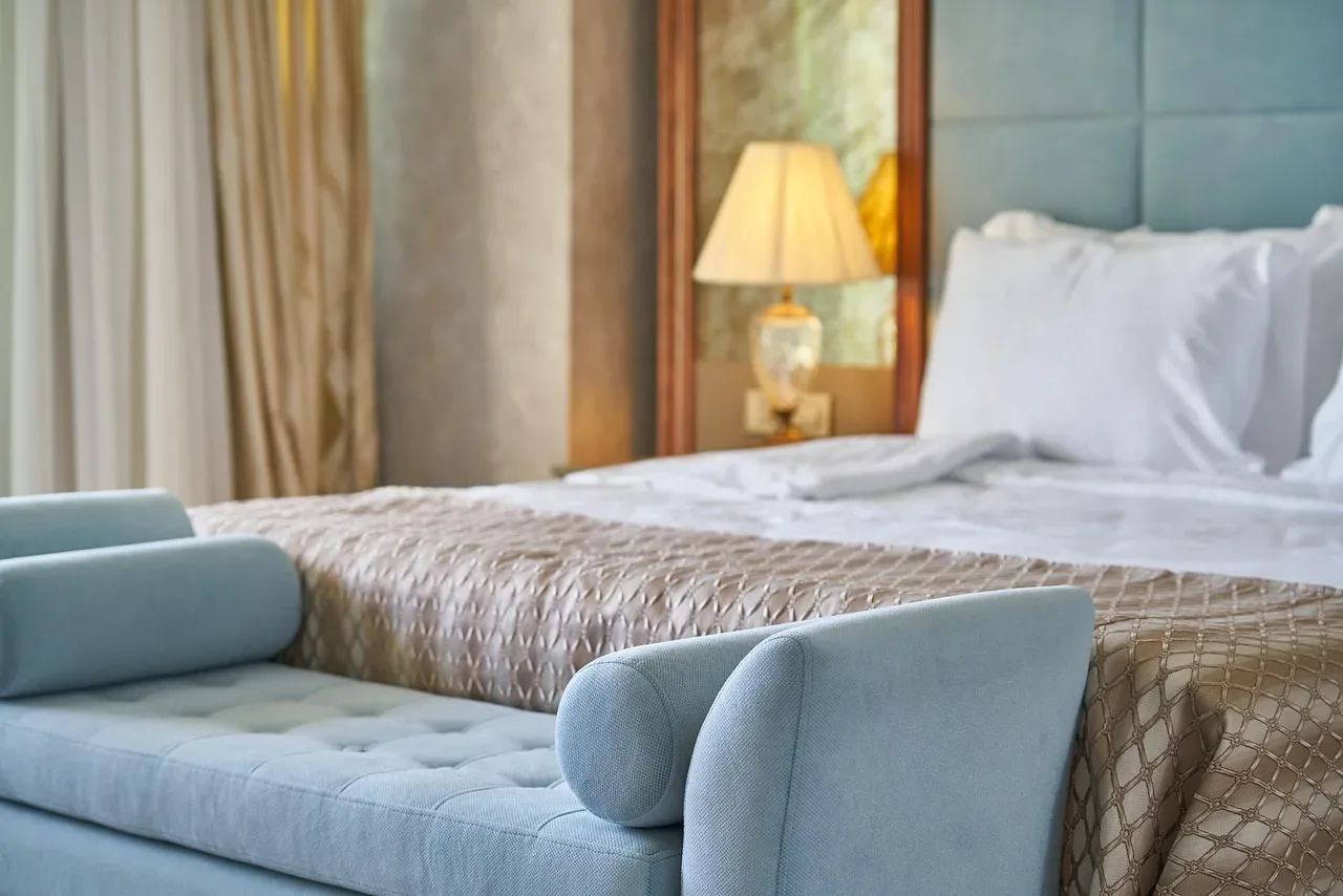 upholstered linen headboard cozy bedroom neutral tones